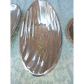 A  COLLECTION OF ALUMINIUM ALLOY PLATTERS  SOLD AS IS
