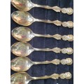 A complete 24kt gold plated entire set of EETRITE desert teaspoons and forks