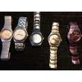 A COLLECTION OF 5 SWATCH WATCHES