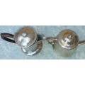 TWO ANTIQUE SILVER PLATED JUGS SOLD AS IS