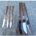 A VINTAGE JOB LOT CUTLERY KNIVES SOLD AS IS