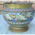 AN ANTIQUE BRASS PLANTER WITH ORNATE DESIGN SOLD AS IS
