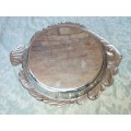 A STEEL ROUND FISH SERVING TRAY