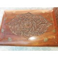 An antique and vintage collection of wooden jewelry boxes some with brass inlay designs sold as is