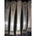 A VINTAGE 21-PIECE INSIGNIA PLATE STAINLESS STEEL CUTLERY COLLECTION