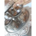 A COMPLETE ORNATE SILVER PLATED KIDDUSH CUP SET