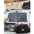 A BULK JOBLOT WOMAN`S HANDBAGS SOLD AS IS