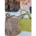 A COLLECTION JOB LOT GUESS AND OTHER BRANDED DESIGNER  LADY`S HANDBAGS