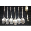 A COLLECTION OF 7 FIGURAL EPNS TEASPOONS