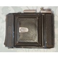 AN ANTIQUE ZEIS IKON CAMERA SOLD AS IS