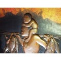 STUNNING COPPER RELIEF OF FISHERMAN