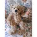 Toy bear - Heartfelt Collectibles Inc