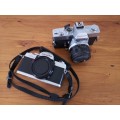 Two Minolta 35mm film cameras