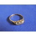 9ct Gold ring with 3 x white stones