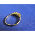 9ct Gold ring with 3 x white stones