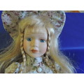 Vintage Porcelain Doll (Plated pony tails)