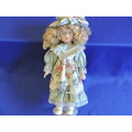 Vintage Porcelain Doll (with specticles)
