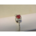 Sterling Silver Ruby & Zirconia (red stone) ring.