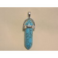 Contemporary Turquoise pendant ( crystal cut blue stone pendant).