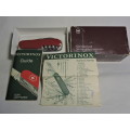 Victorinox Swiss Champ pocket knife with original box and pamphlet. Like new