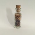 Miniature Glass Bottle of Seeds