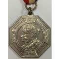 Real Silver Jubilee Medal of King George V and Queen Mary.