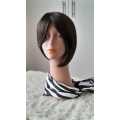 Full cap synthetic wig with a side bang