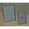 A Pair of Silver Plated Brass, Lacquer Coated Photo Frames with Black Velvet Back Plates by Bowon