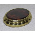 Vintage Oval Gold Tone KIGU powder compact with Faux Tortoise Shell decoration c1950