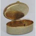 Vintage gold tone Rococo style pill box with Fragonard Courting Couple Decoration