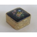 Small square gold tone pill box with cobalt blue floral bouquet ceramic decoration