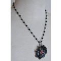Vintage silver tone black and red flower pendant necklace
