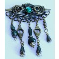 Vintage Antique Brass tone with emerald green stones