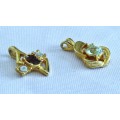 Pair of vintage gold tone 1970s style pendants with faceted crystal