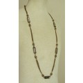 Vintage designer gold tone and faceted crystal bead necklace signed `d`