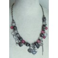 Vintage silver tone, clear and pink glass beads and charms necklace