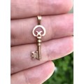 Striking Rose gold key 9ct pendant