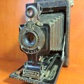 No. 1-A Autographic Kodak Junior fold-out photo camera and a Ciné-Kodak Eight Model 25 movie camera