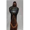 Tall ceramic sculpted  figurine on wooden stand LOOK!!