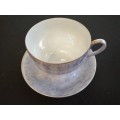 Over-sized Lustreware teacup and saucer