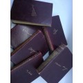 Leather bound books Author names written in gilt on front cover x 6