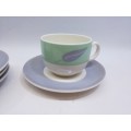 Small cup and saucers in milk glass