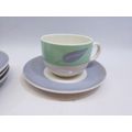 Small cup and saucers in milk glass