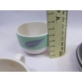 Small cup and saucers in milk glass