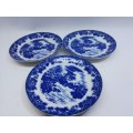Three blue saucers