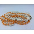 Stunning orange and white plastic necklace