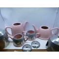 Vintage 1950`s insulated teapot plus milk jug and sugar bowl in baby pink. Coffee pot damaged