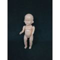 Vintage small Hard plastic doll