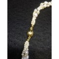 Perfect string of authentic pearls with 18ct gold clasp - A find!