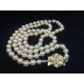 Perfect string of beautiful faux pearls
